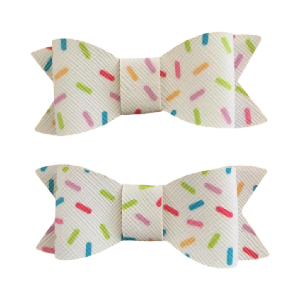 White coloured sprinkles Bow clips set