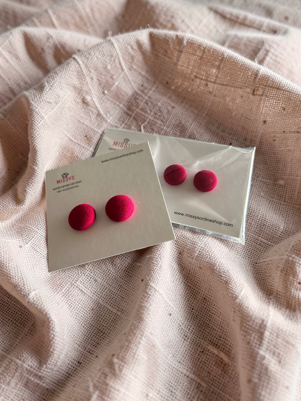 Crimson fabric button